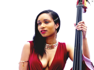 Angelique Francis in a red dress, posing with her upright bass