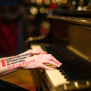 Hands on a piano keyboard with the Concours musical international de Montréal sur la route logo